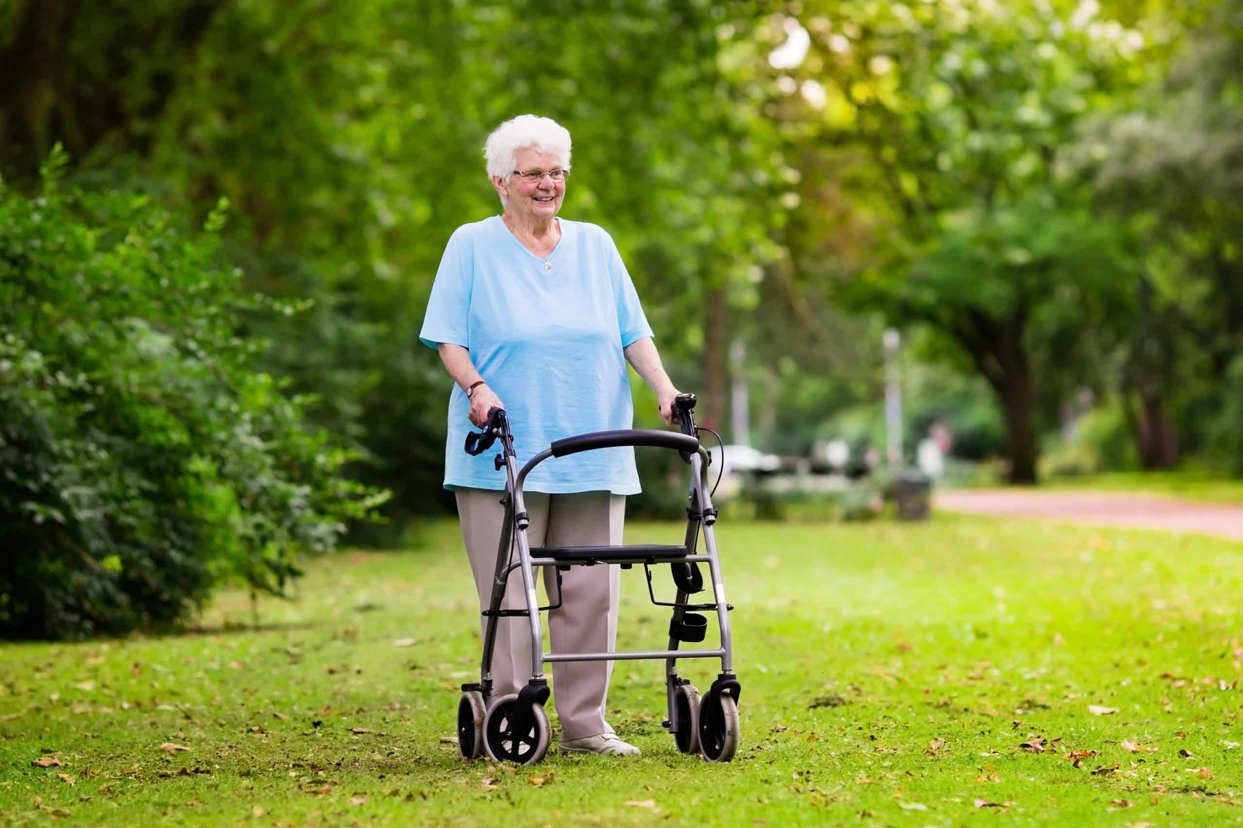 Woman taking a rollator walk